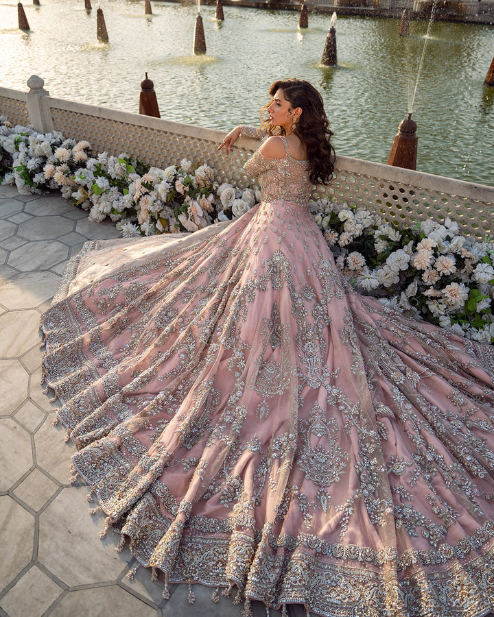 Faiza Saqlain Aysana seated view with fanned embroidered gown train