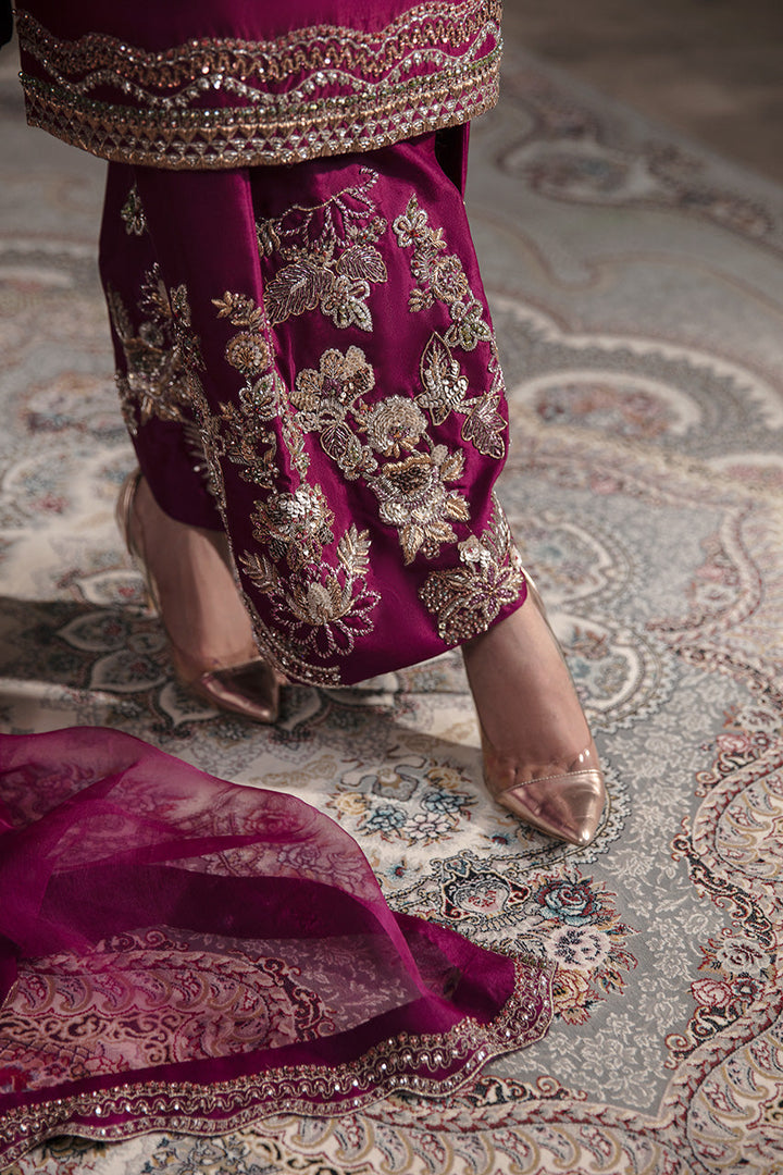 Eliana magenta silk outfit close-up of embroidered trouser hem and dupatta border