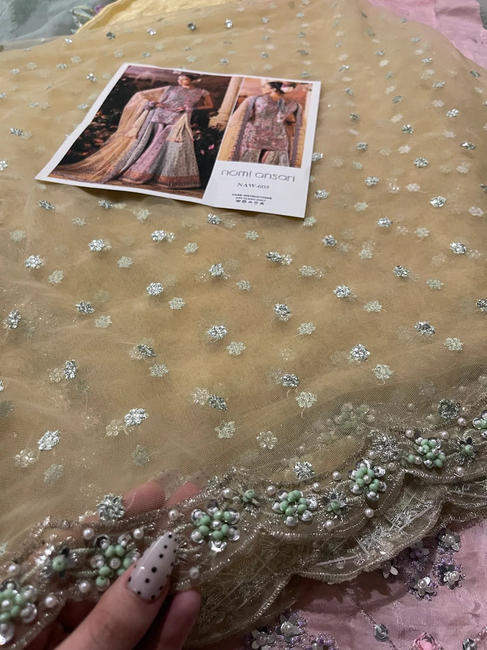 Nomi Ansari – Rosebud Style, embroidered net panel with design reference