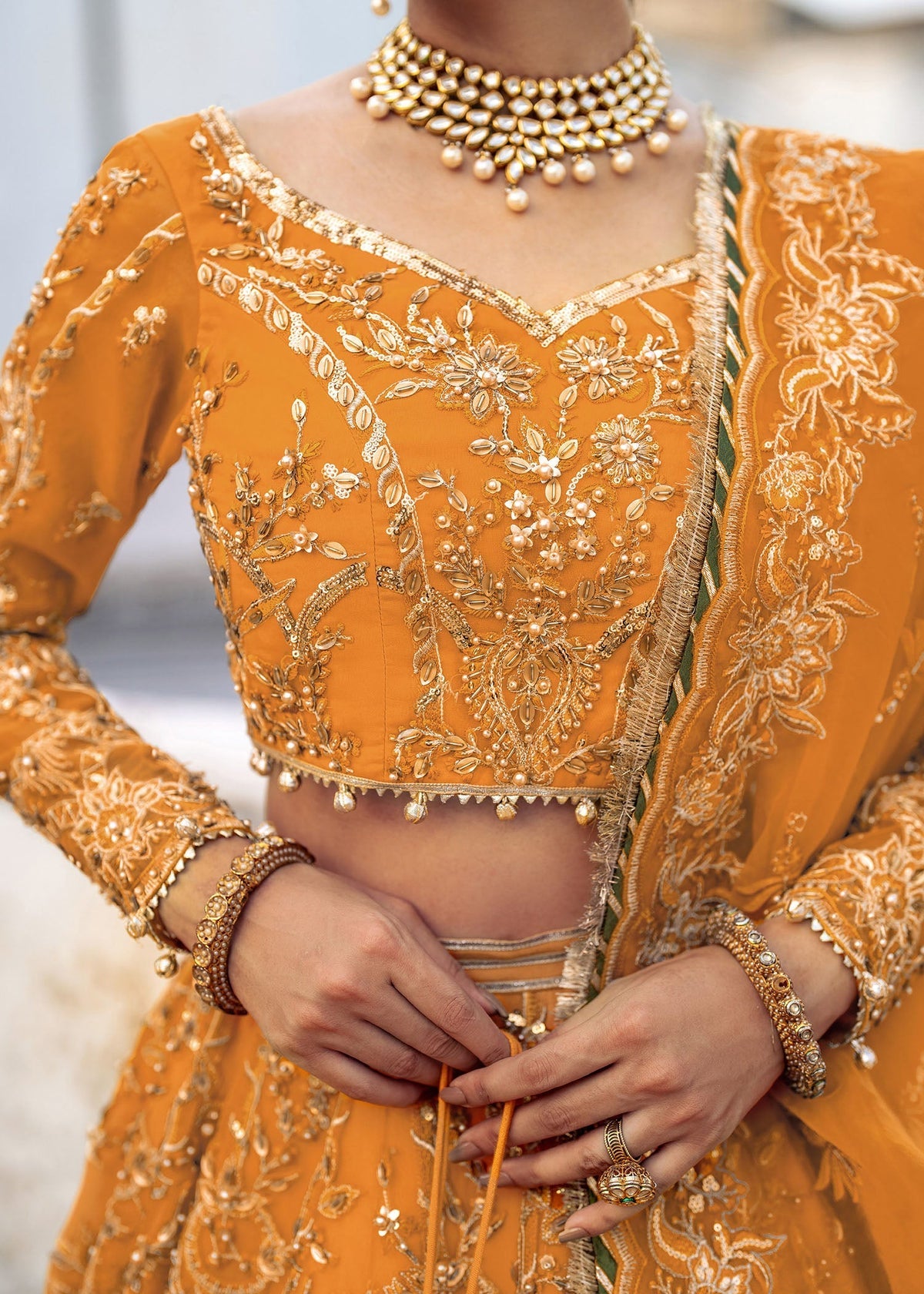 Tehzeeb orange lehenga choli, reference outfit photograph 3 — Made by Mairaz reproduction