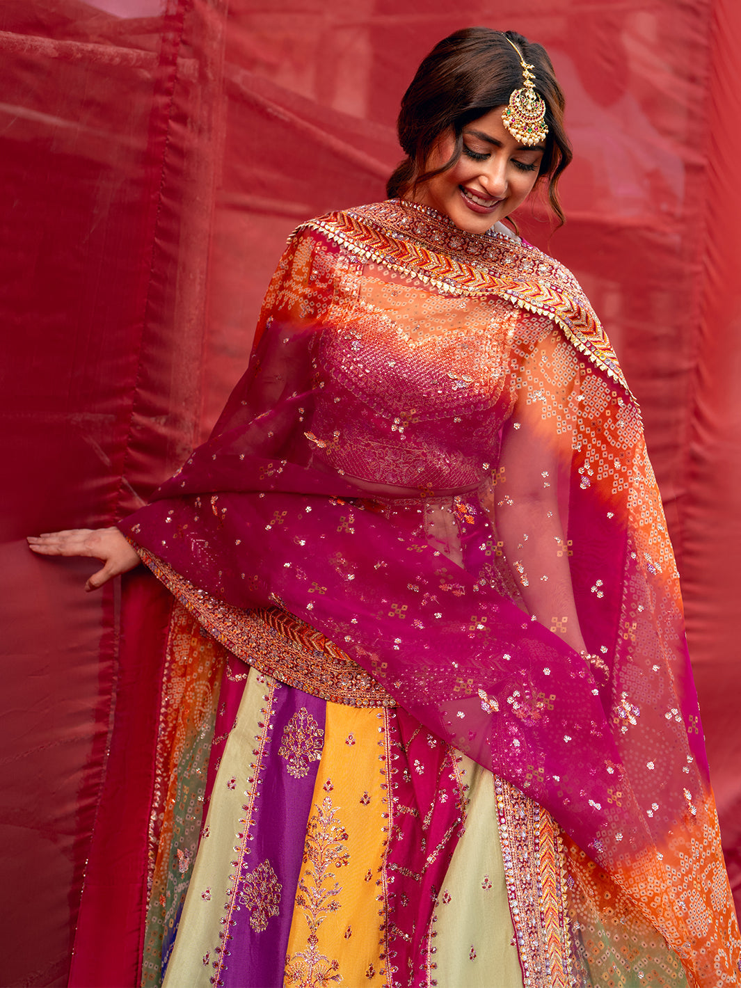 Mala lehenga set close-up of magenta blouse and sheer embroidered dupatta