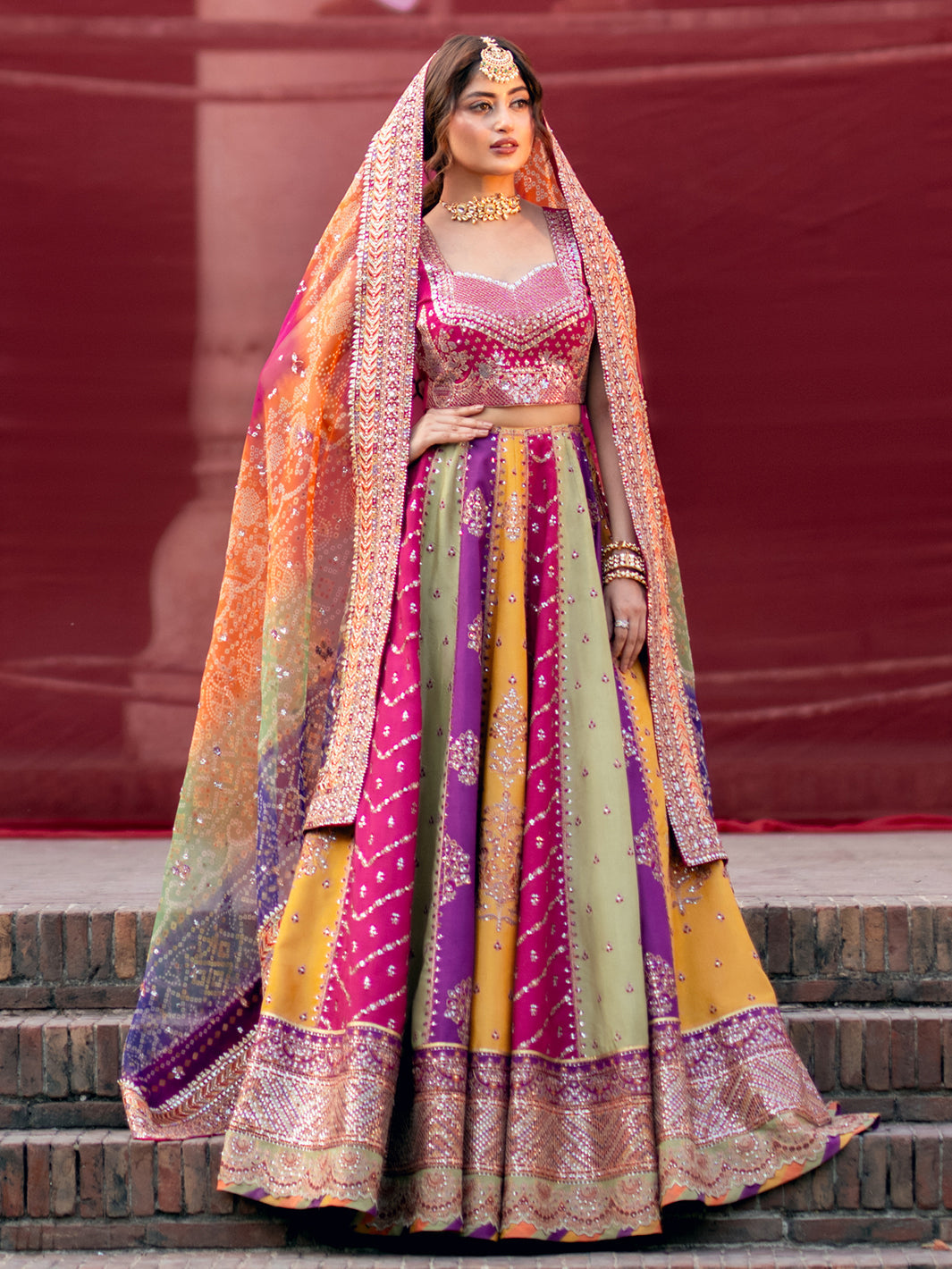 Mala magenta embroidered blouse with multicolour panelled lehenga full look