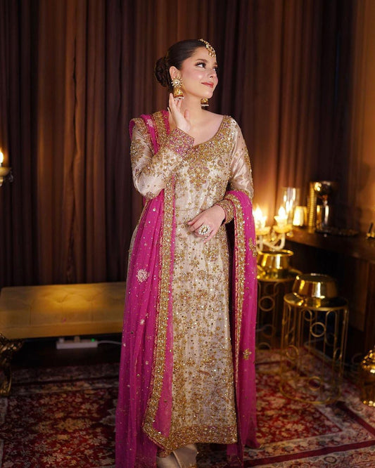 Haris Shakeel style — Mairaz gold and pink three-piece suit reference, view 1 of 4
