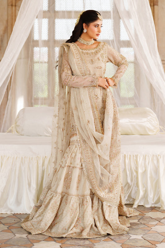 Aneeqa, made by MAIRAZ — full-length front view of the beige embroidered shirt, layered gharara and dupatta