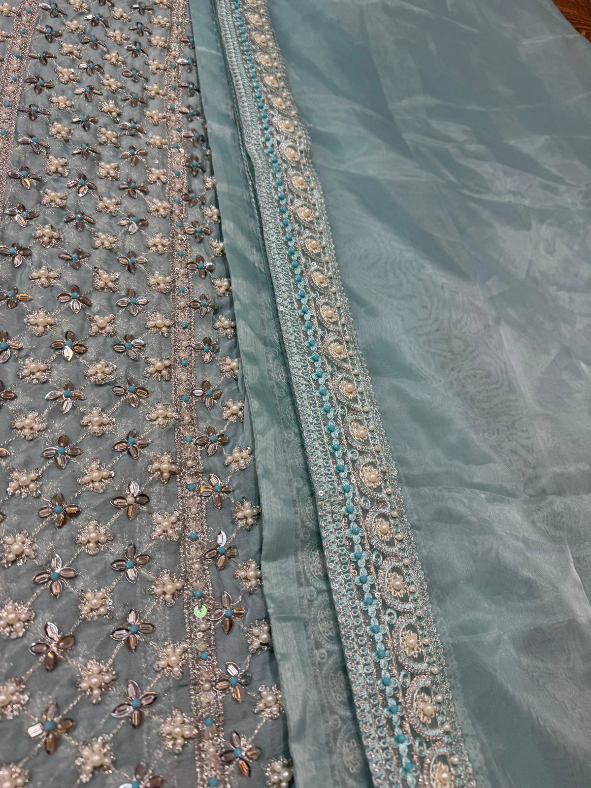 Élan – Célestine Style, hem border and edge embroidery detail