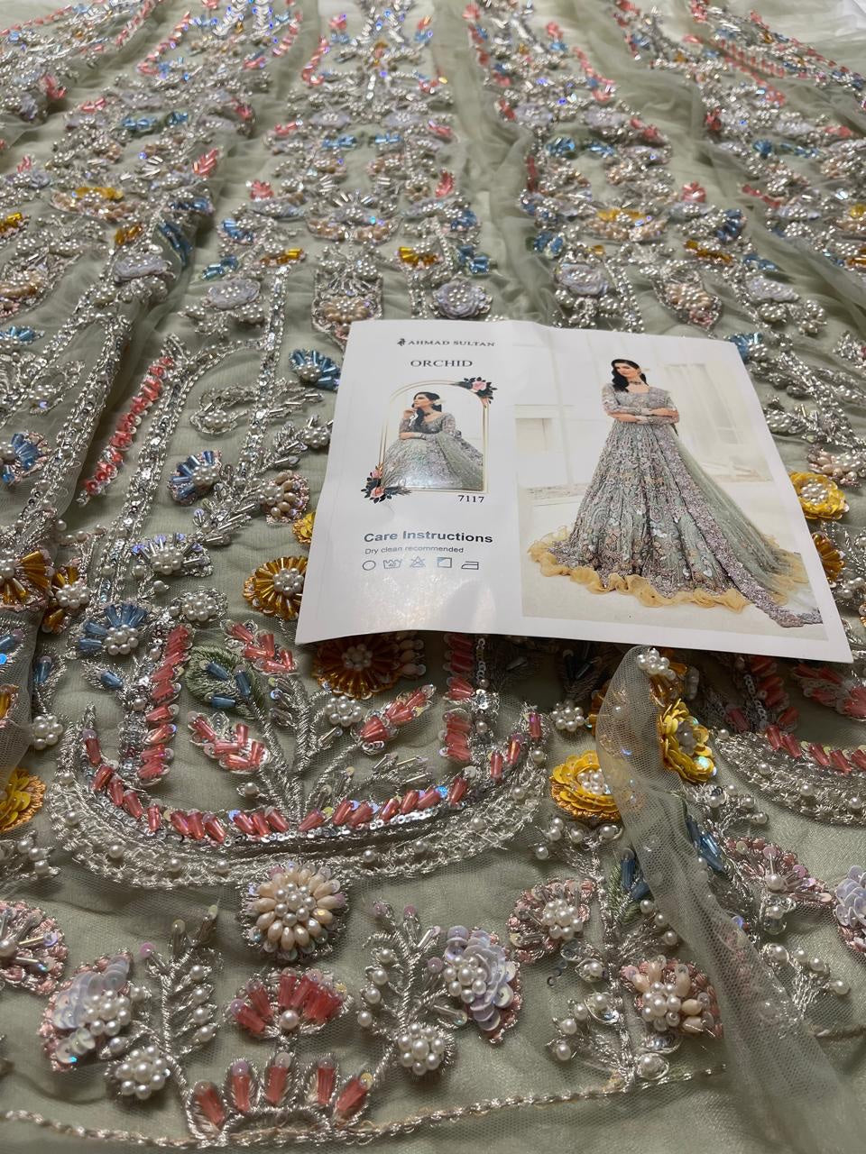 Ahmad Sultan Orchid style embroidery detail 1