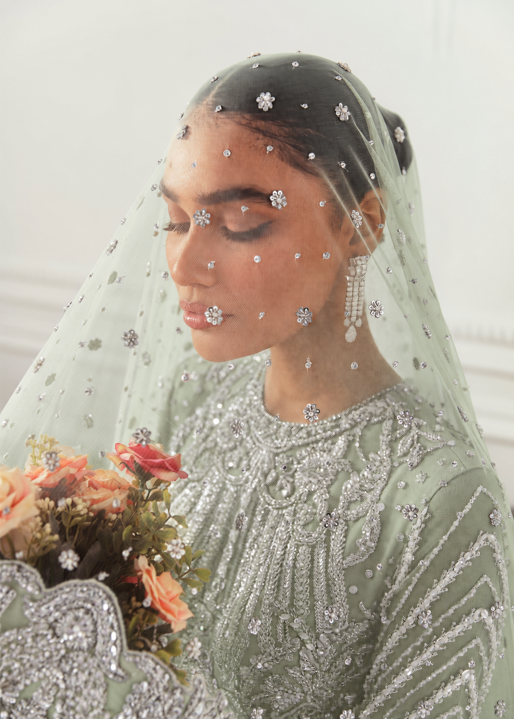 Akbar Aslam Hyacinth Pistachio bridal maxi hem detail
