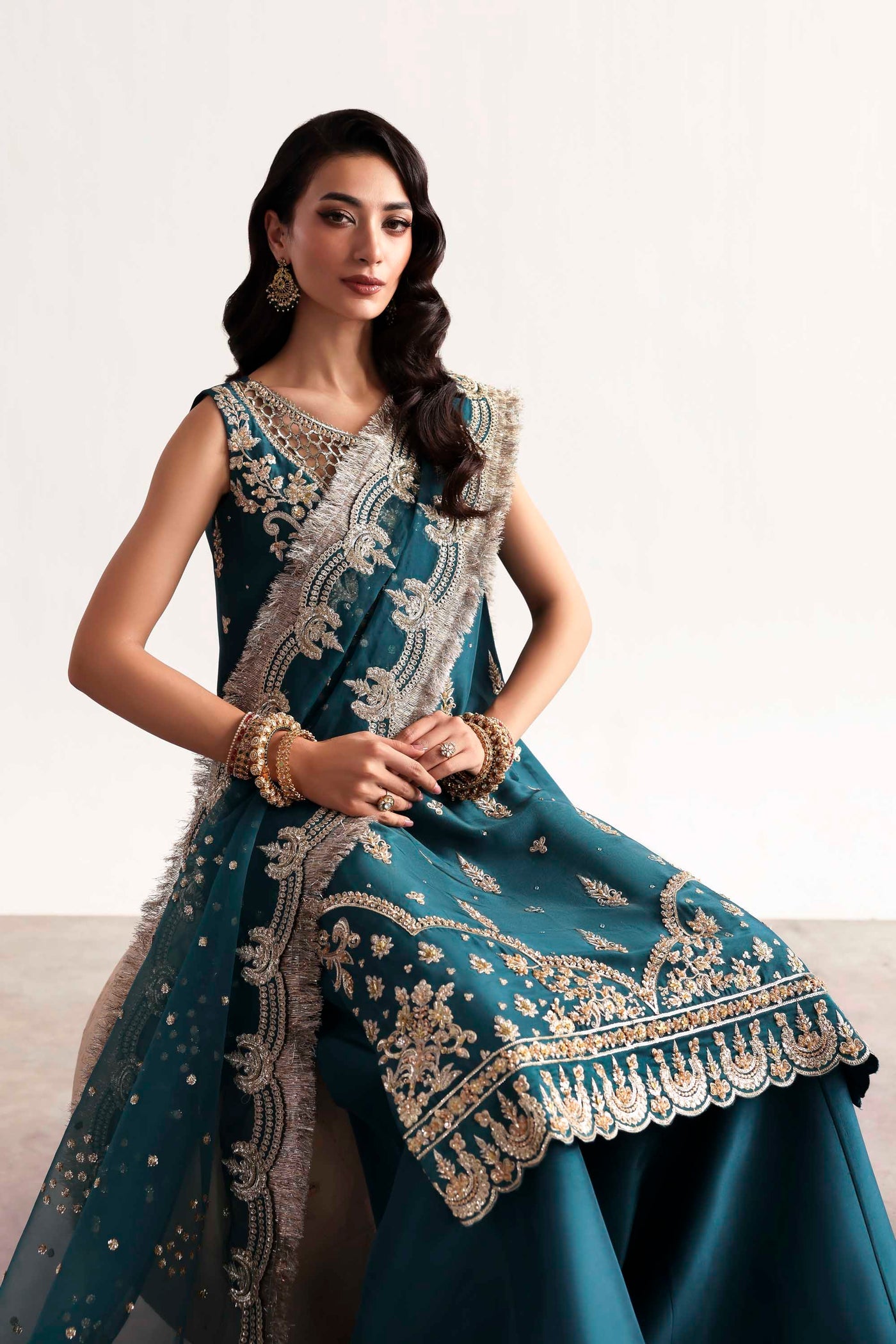 Akbar Aslam Teal Style — Mairaz reproduction seated embroidery detail