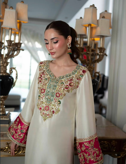 Aleena Khan Noor e Nazar style ivory outfit embroidered neckline detail