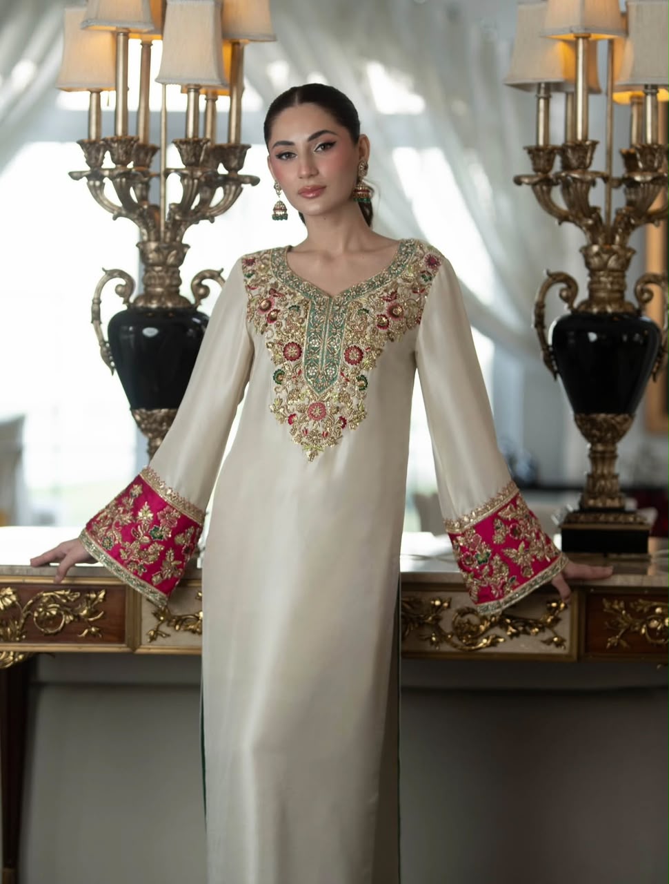 Aleena Khan Noor e Nazar style ivory formal outfit front view with pink cuffs
