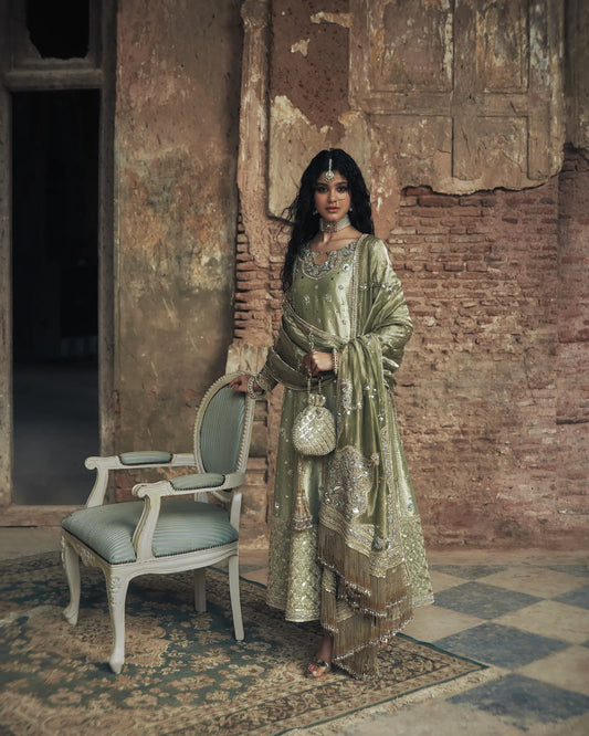 Iqbal Hussain CC-21 style — Mairaz pistachio green three-piece suit reference, view 1 of 6