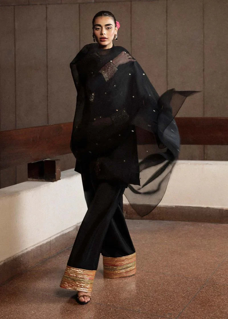 Char black formal outfit back view showing sheer dupatta drape