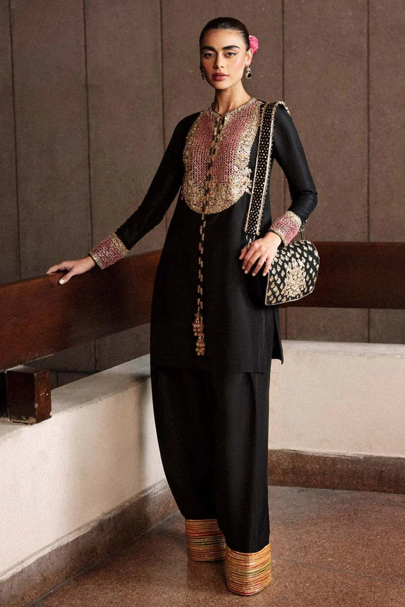 Char black formal outfit front view with gold bordered trouser hem