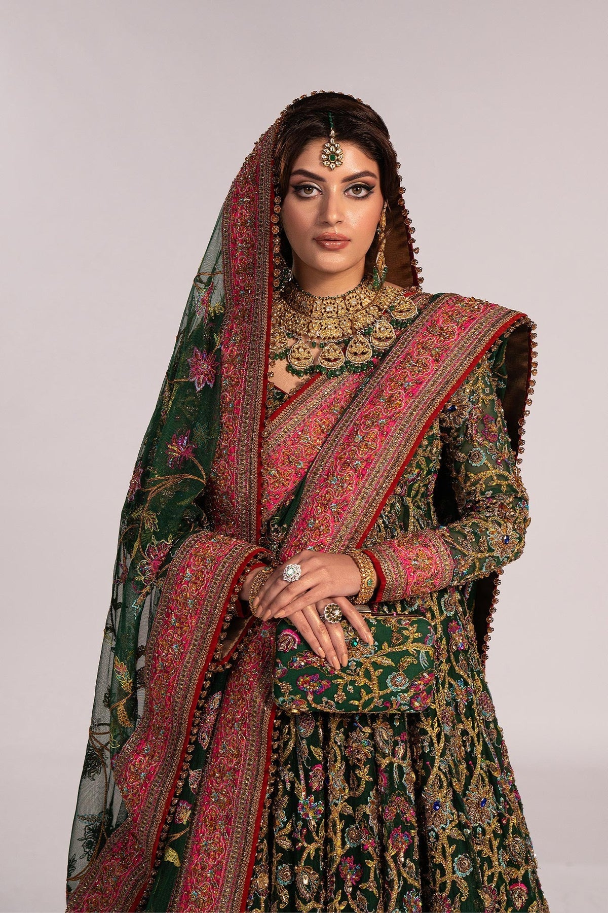 Fahad Hussayn Jhumath style bottle green embroidered bridal look