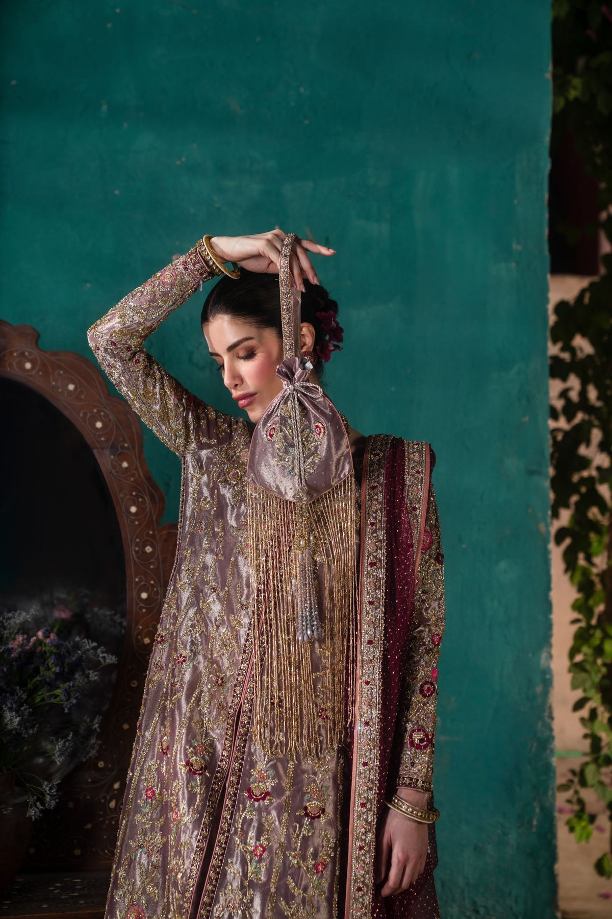 Farah and Fatima Inaya Style embroidered potli and sleeve detail