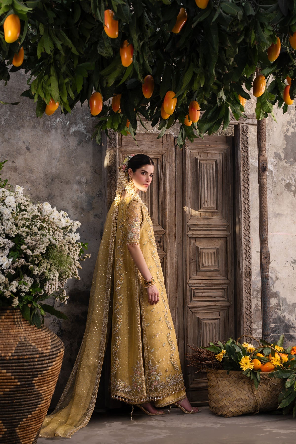 Farah and Fatima Zareen Style mustard gold formal side profile full length