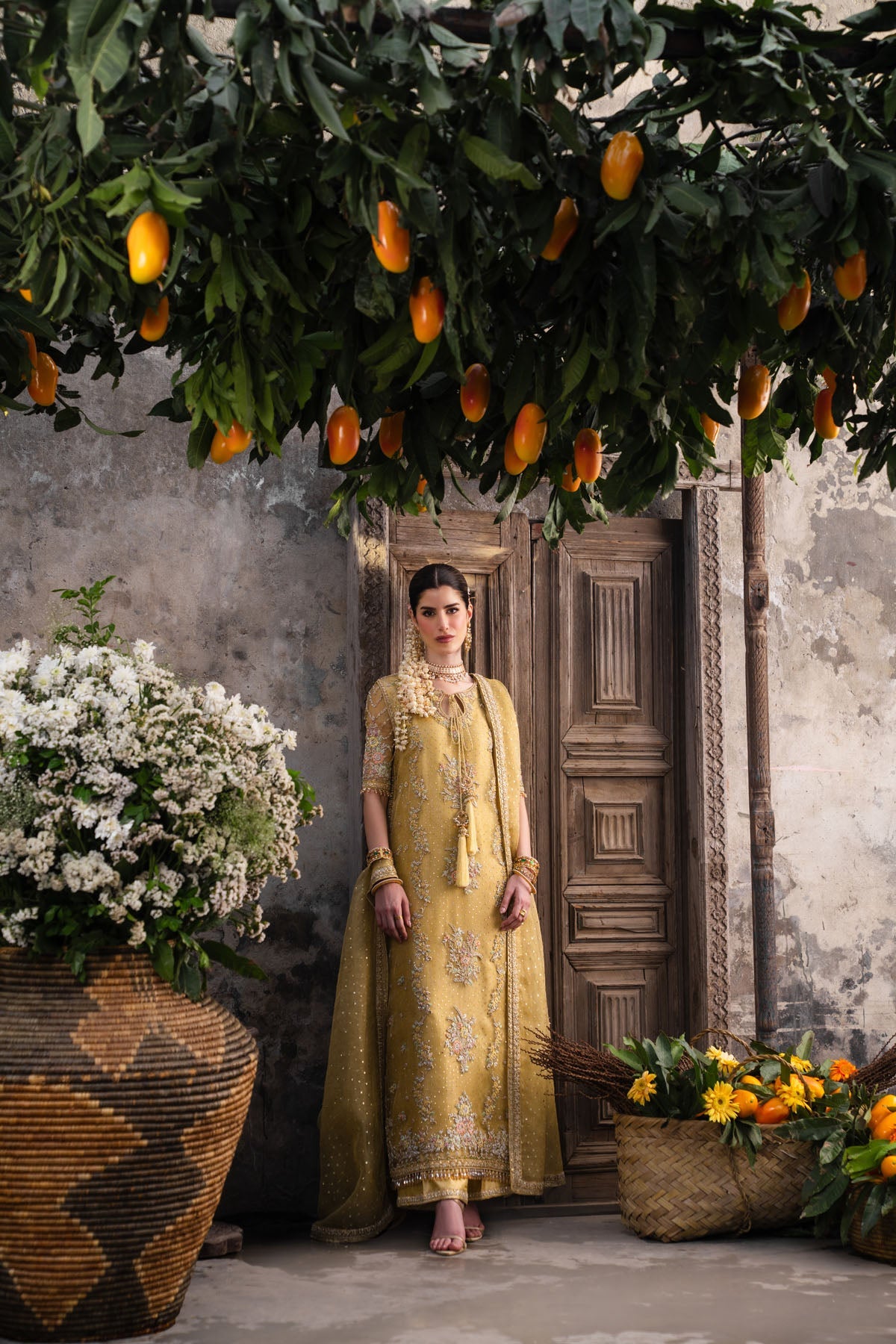 Farah and Fatima Zareen Style mustard gold wedding dress full front portrait
