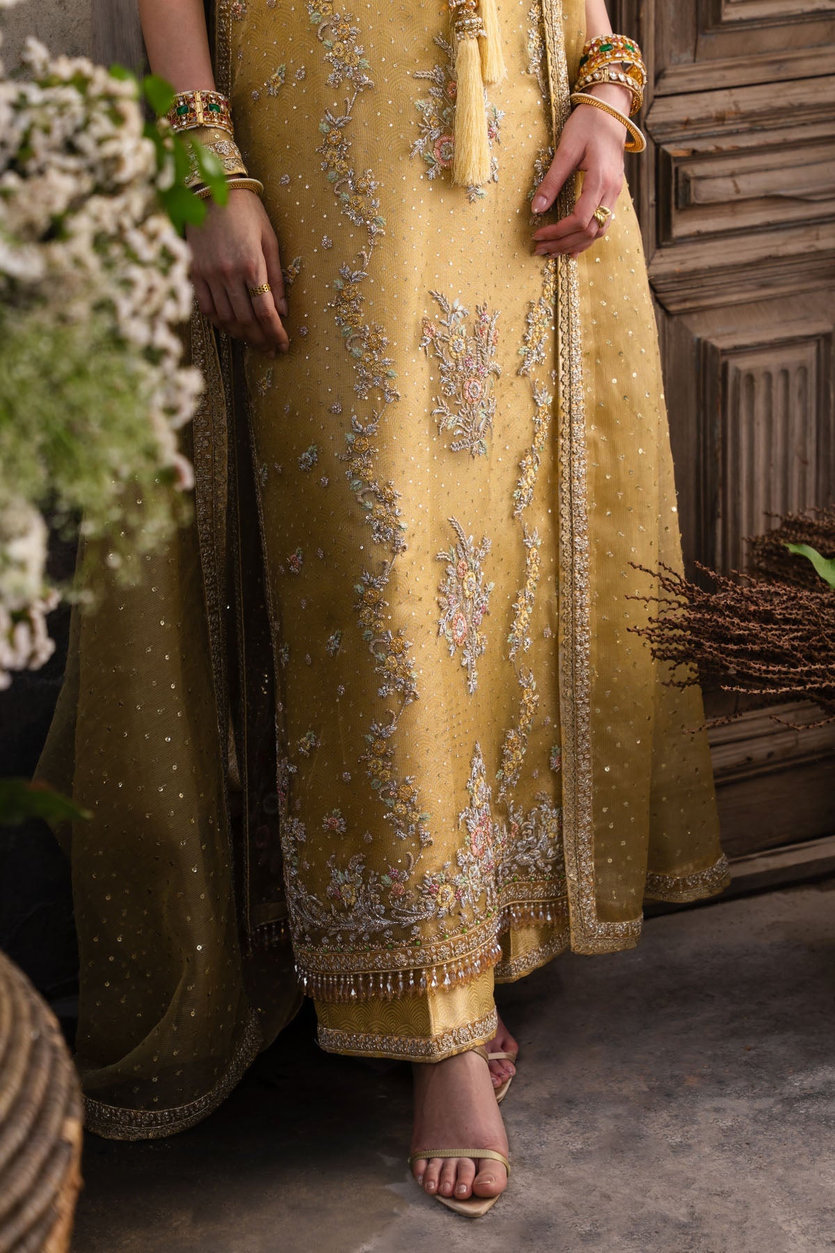 Farah and Fatima Zareen Style floral embroidery hem and azaar pants detail