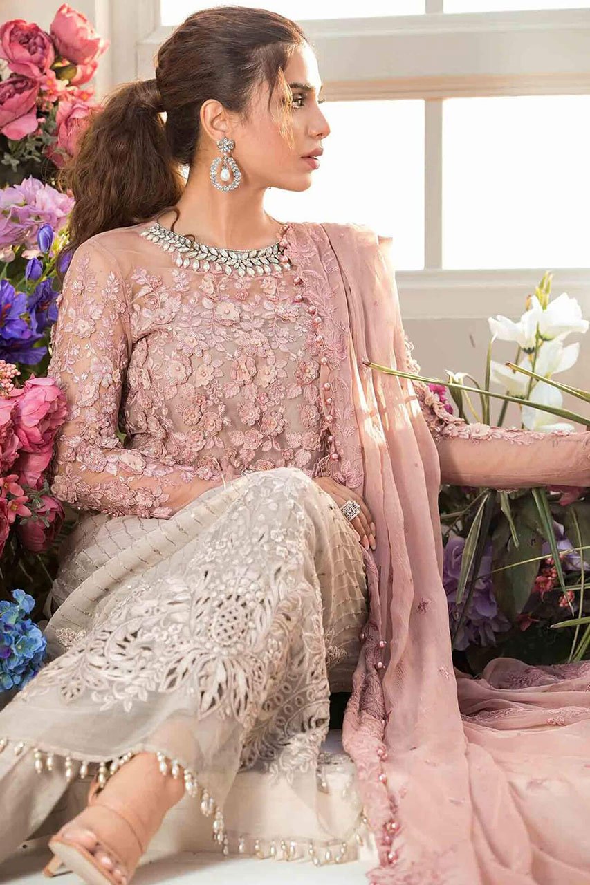 Maria B Mbroidered BD-121 seated view showing embroidered trouser hem detail