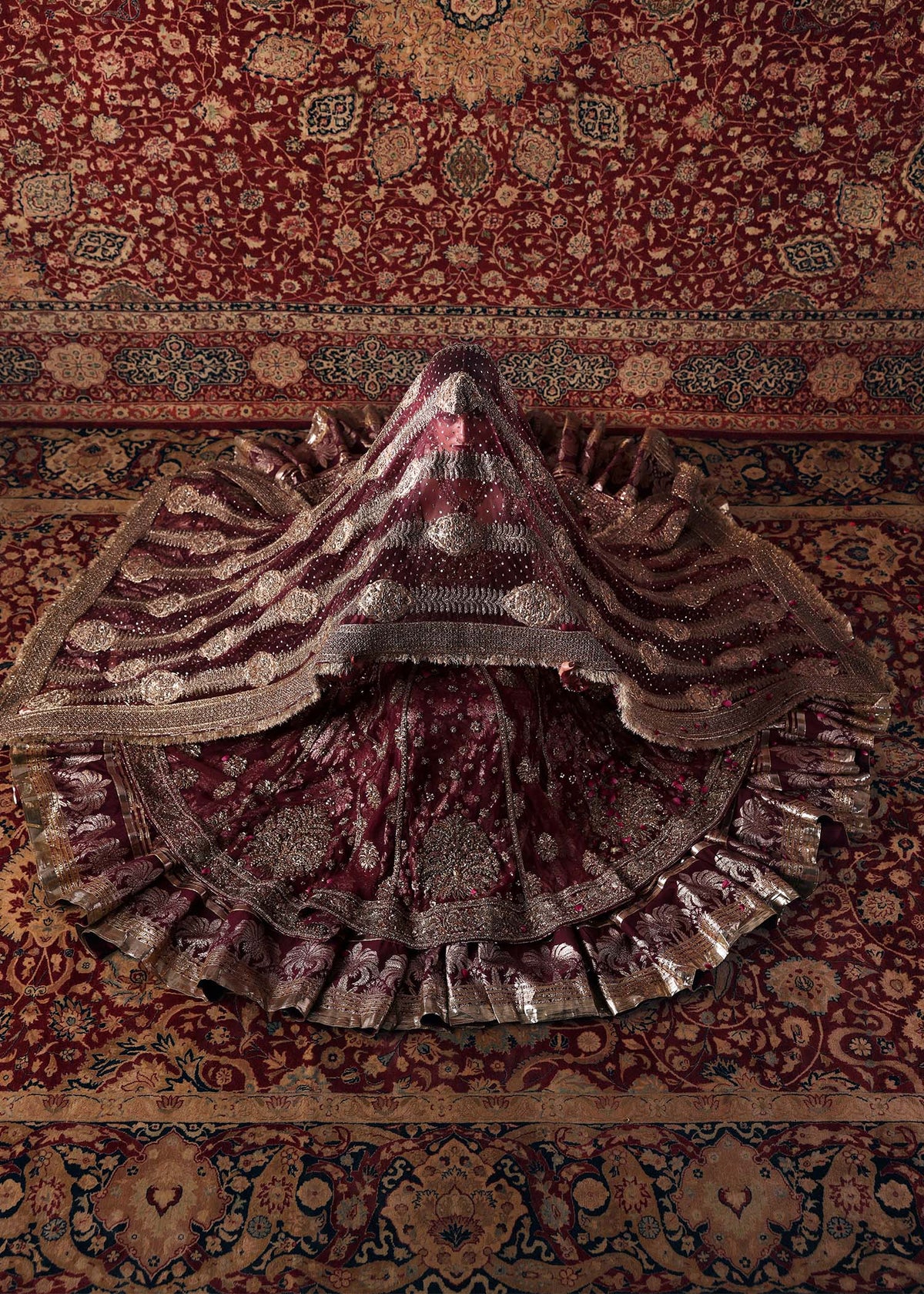 Hussain Rehar Bayaan burgundy maroon pishwas and lehenga — overhead lehenga and dupatta, source design reference