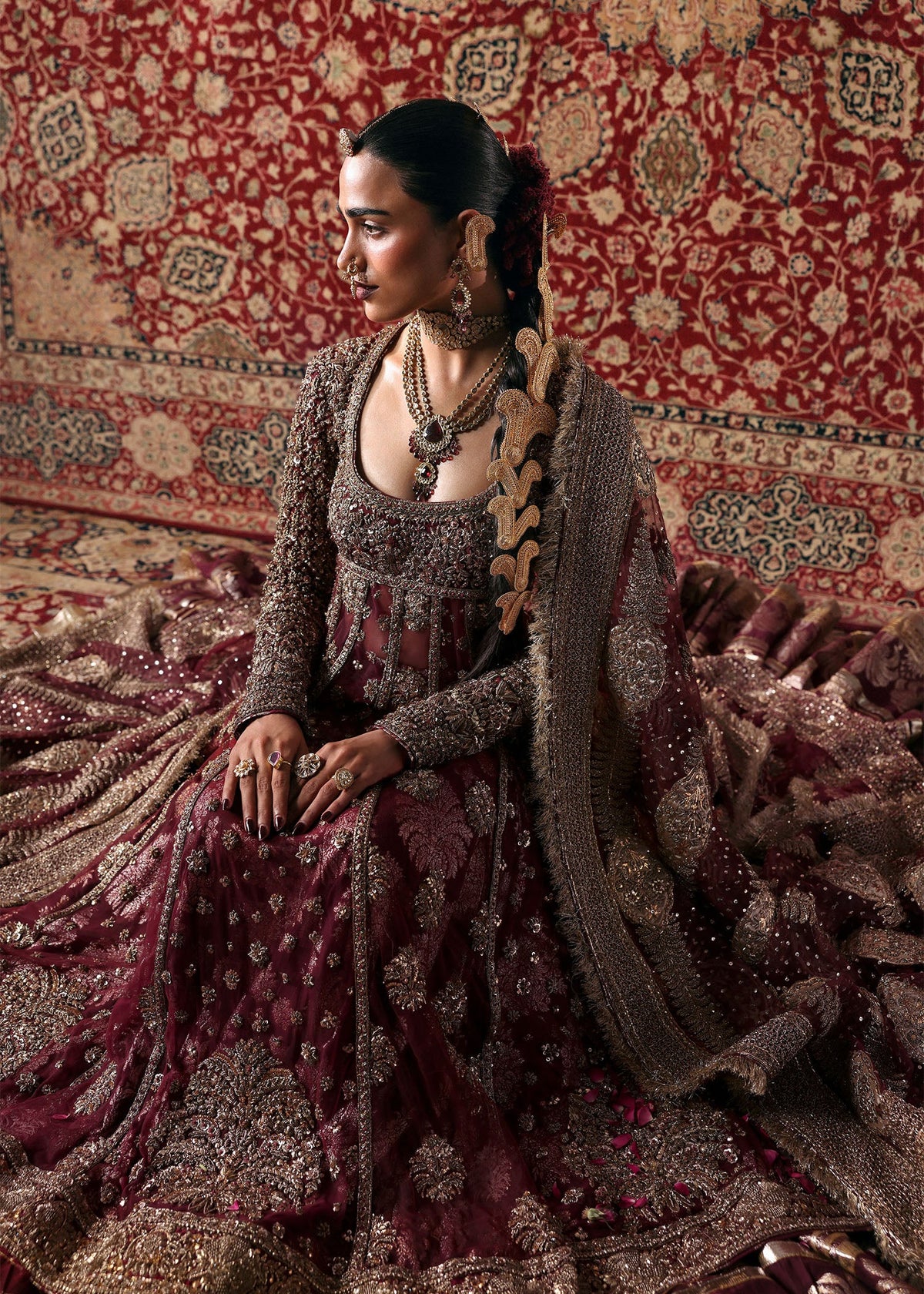 Hussain Rehar Bayaan burgundy maroon pishwas and lehenga — seated skirt detail, source design reference
