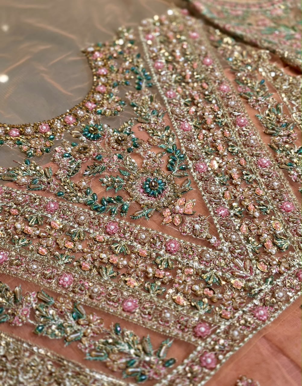 Hussain Rehar Saaz real fabric close-up with rose gold embroidery 1