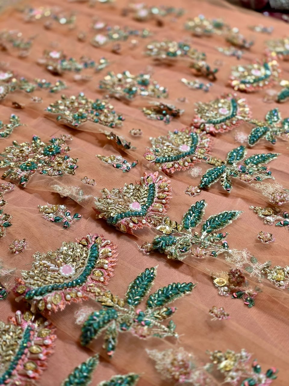 Hussain Rehar Saaz real peach net motif detail