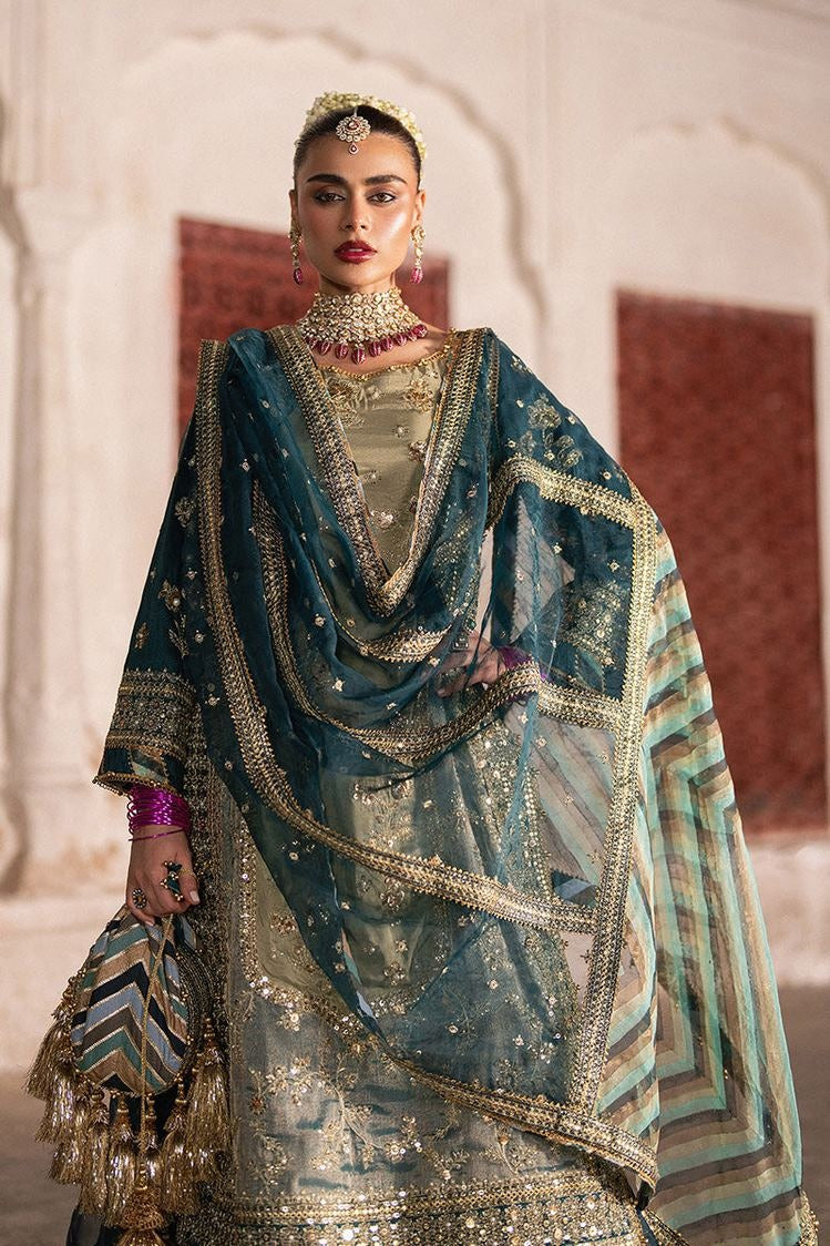 Royal Thread teal outfit front view with net dupatta draped over shoulders