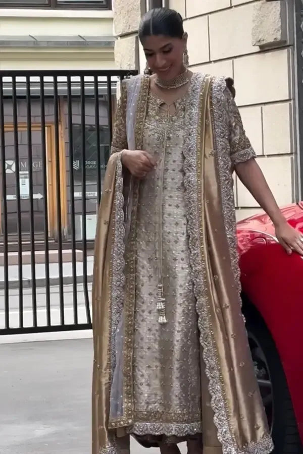 Noor-e-Haseen champagne gold outfit side view with scalloped dupatta border