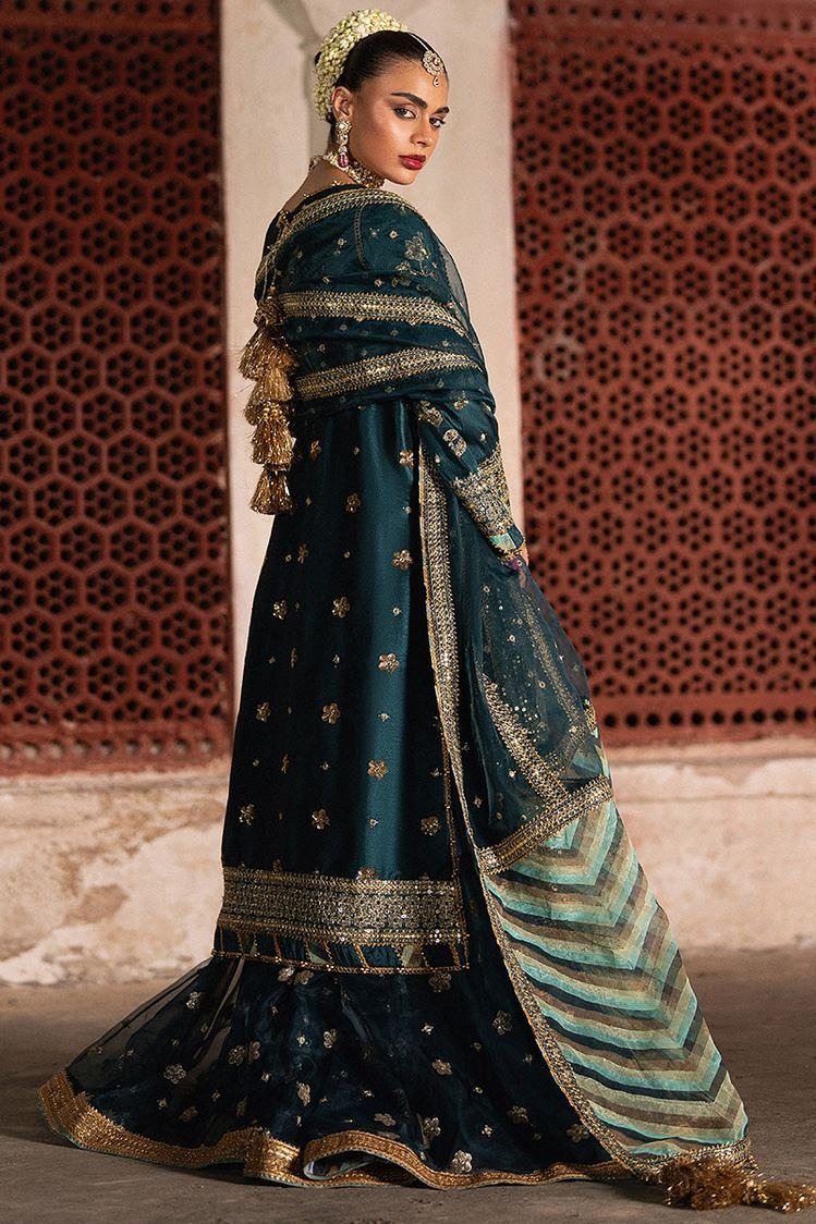 Royal Thread teal formal outfit side view showing skirt and dupatta drape
