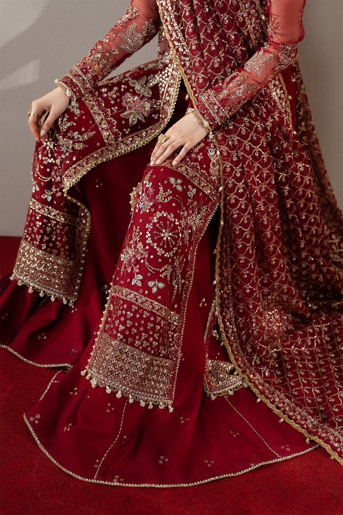 Florentine, made by MAIRAZ — red sharara, hem and sharara embroidery detail
