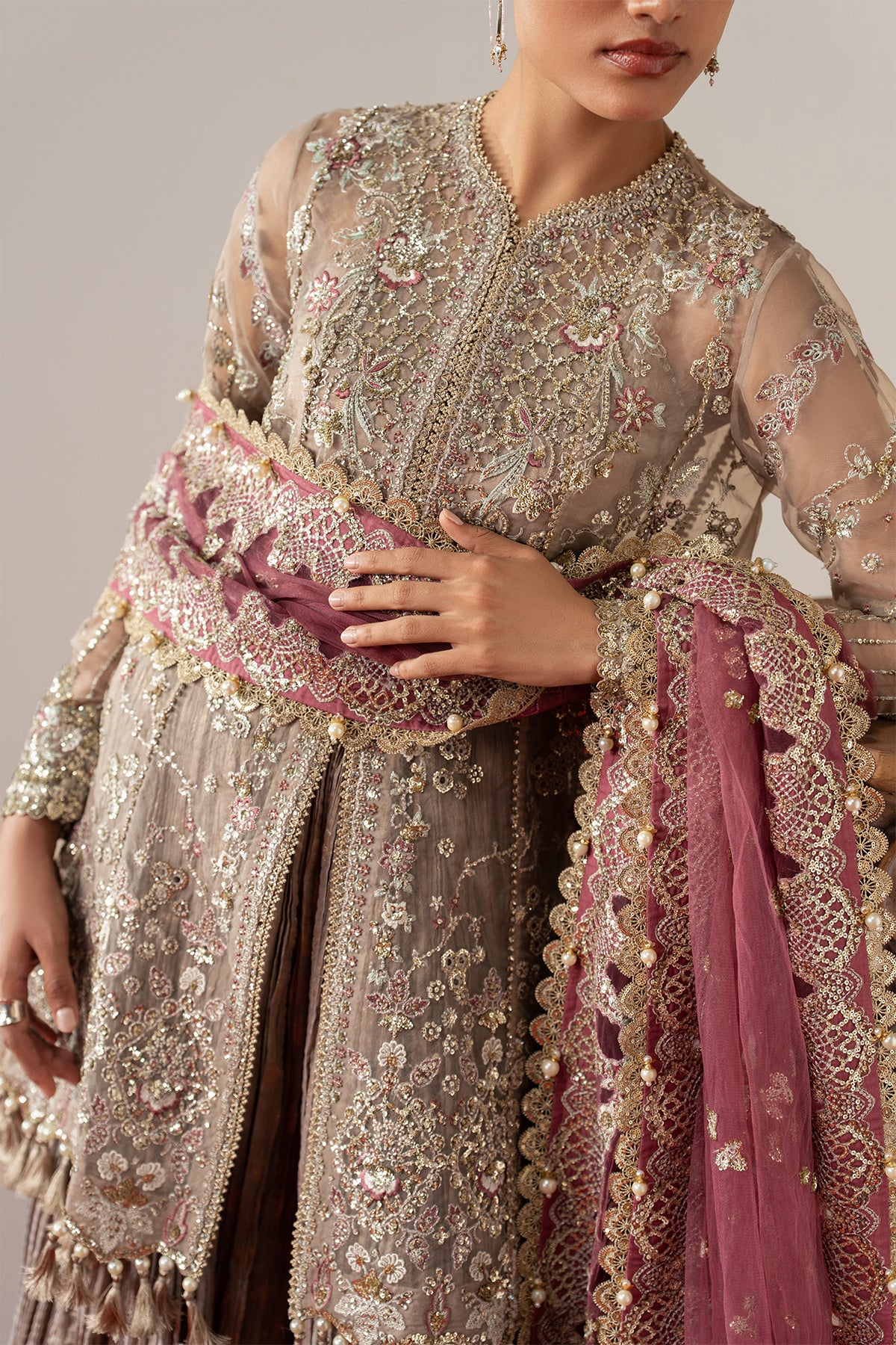 Gilded Grace, made by MAIRAZ — beige with carrot pink dupatta lehenga suit, front embroidery and dupatta border detail