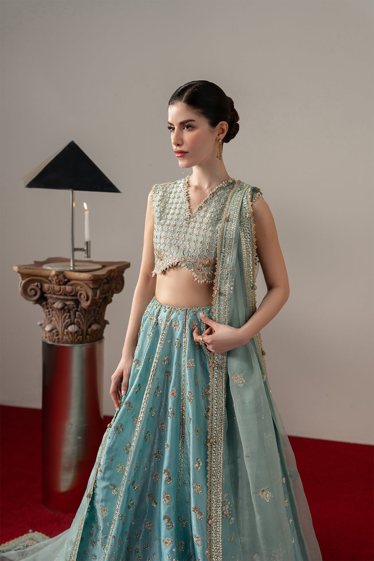 Grandezza, made by MAIRAZ — light and dark ferozi lehenga choli, three-quarter outfit view