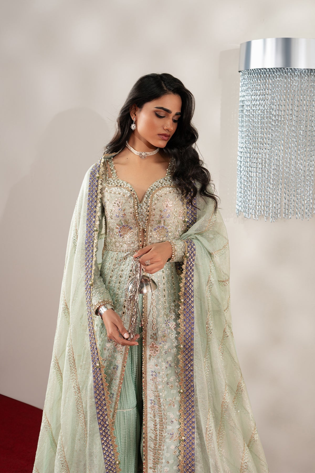 Marais, made by MAIRAZ — light green with purple accents sharara, three-quarter outfit view