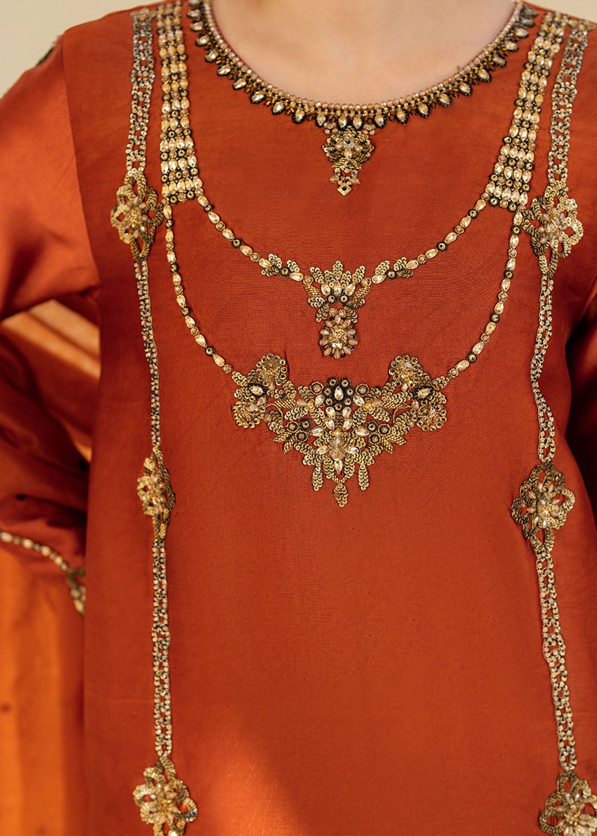 Camilla rust shirt suit, reference outfit photograph 2 — Made by Mairaz reproduction