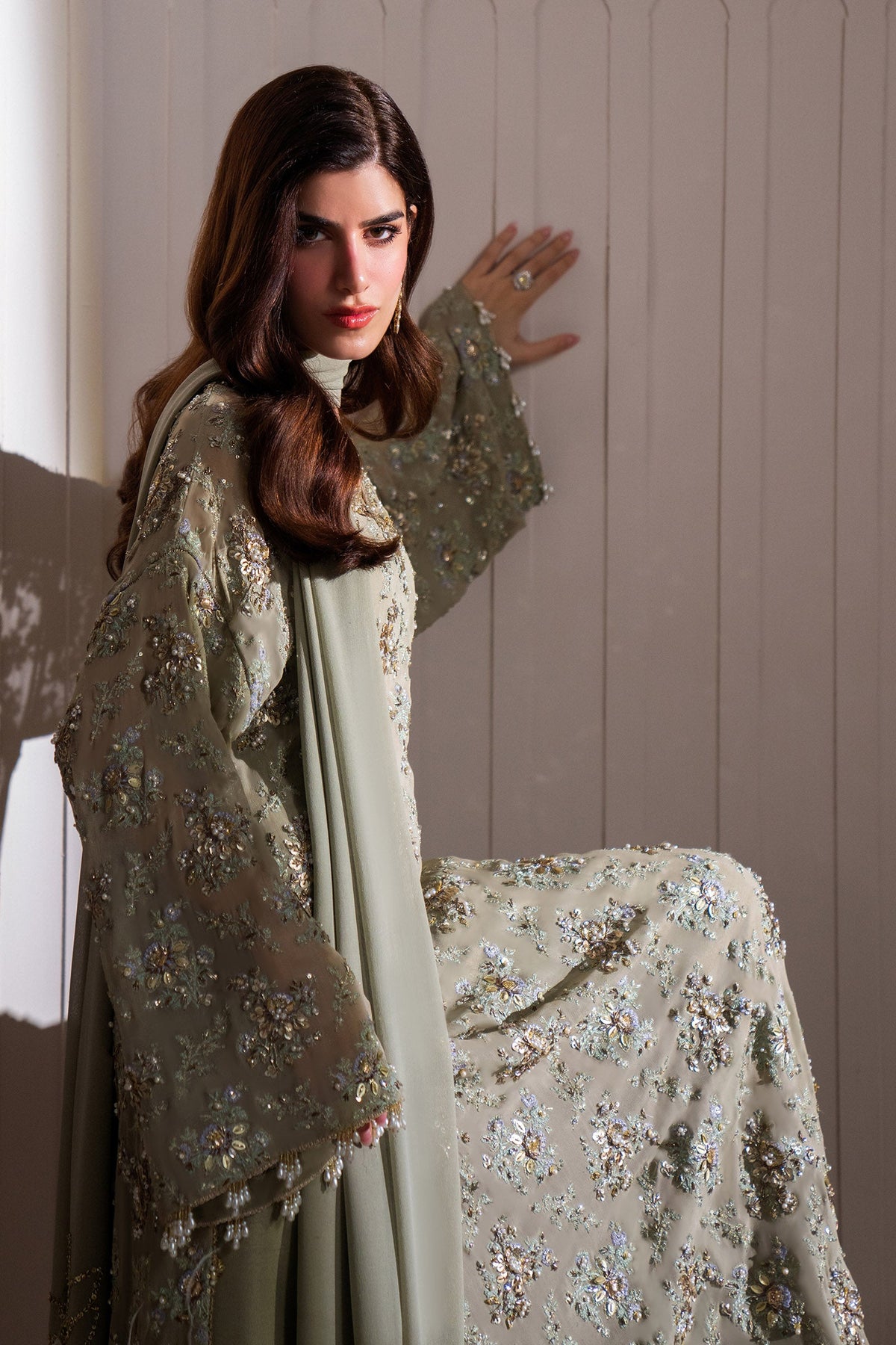 Clarté, made by MAIRAZ — seated side view; design reference