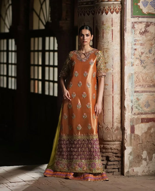 Copper Bloom, made by MAIRAZ — full-length front view of the copper-orange embroidered shirt with green flared trousers and magenta dupatta