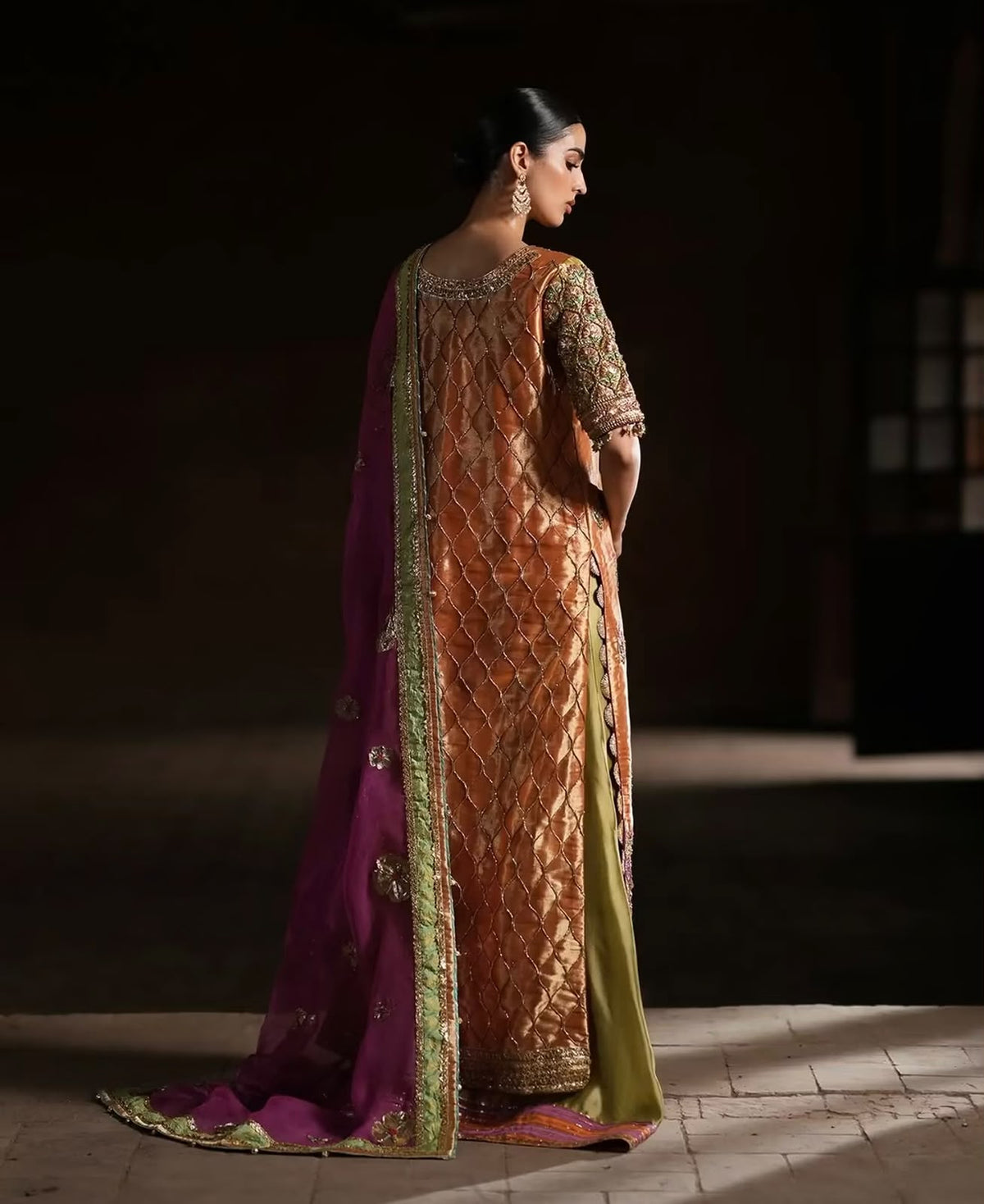 Copper Bloom, made by MAIRAZ — full-length back view showing the lattice embroidery and magenta dupatta