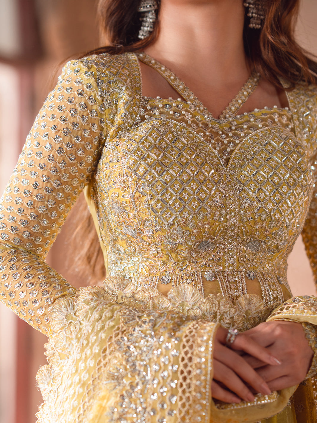 D-606, made by MAIRAZ — embellished bodice close-up; design reference