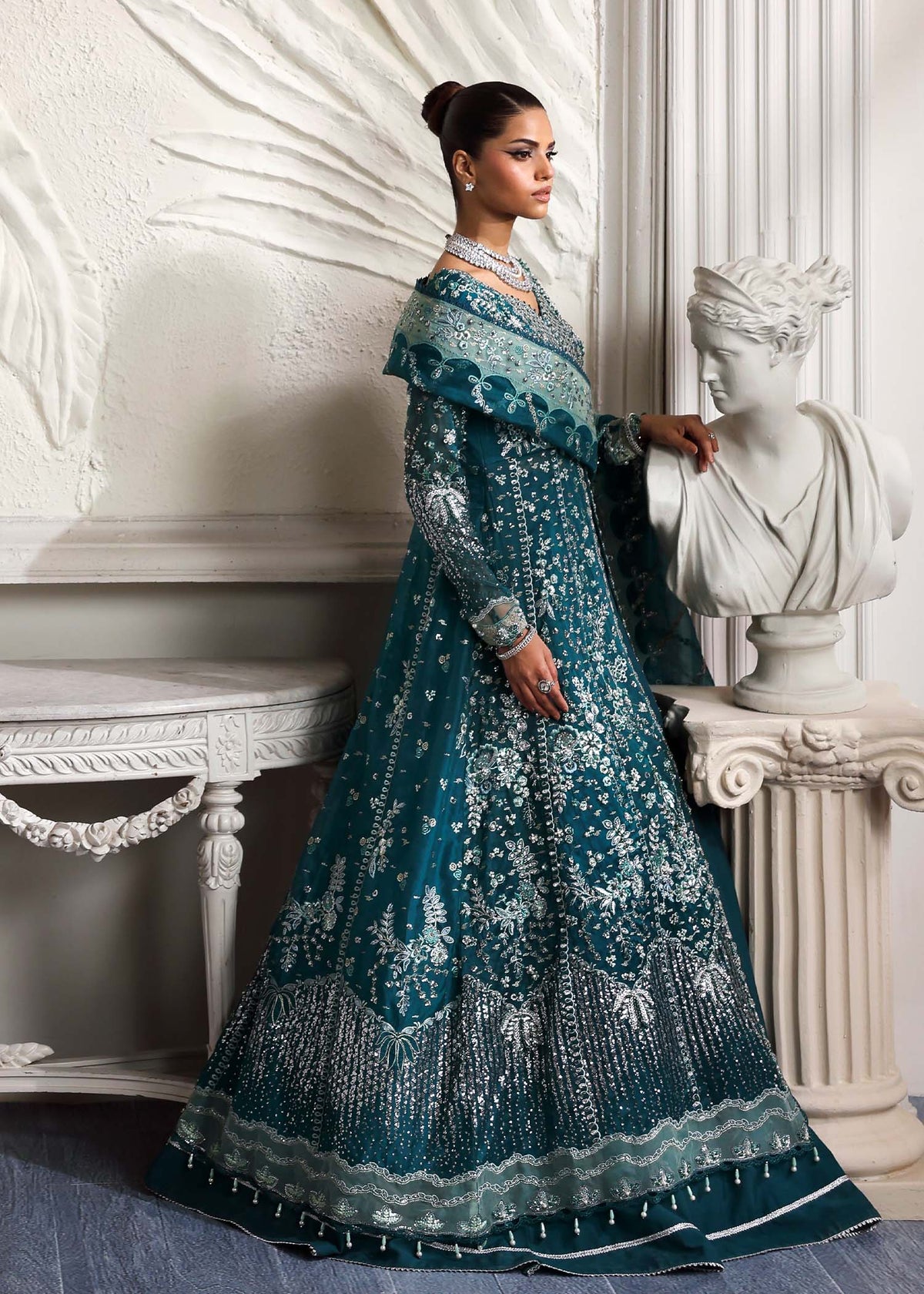 Eclat, made by MAIRAZ — teal green pishwas, side view with dupatta