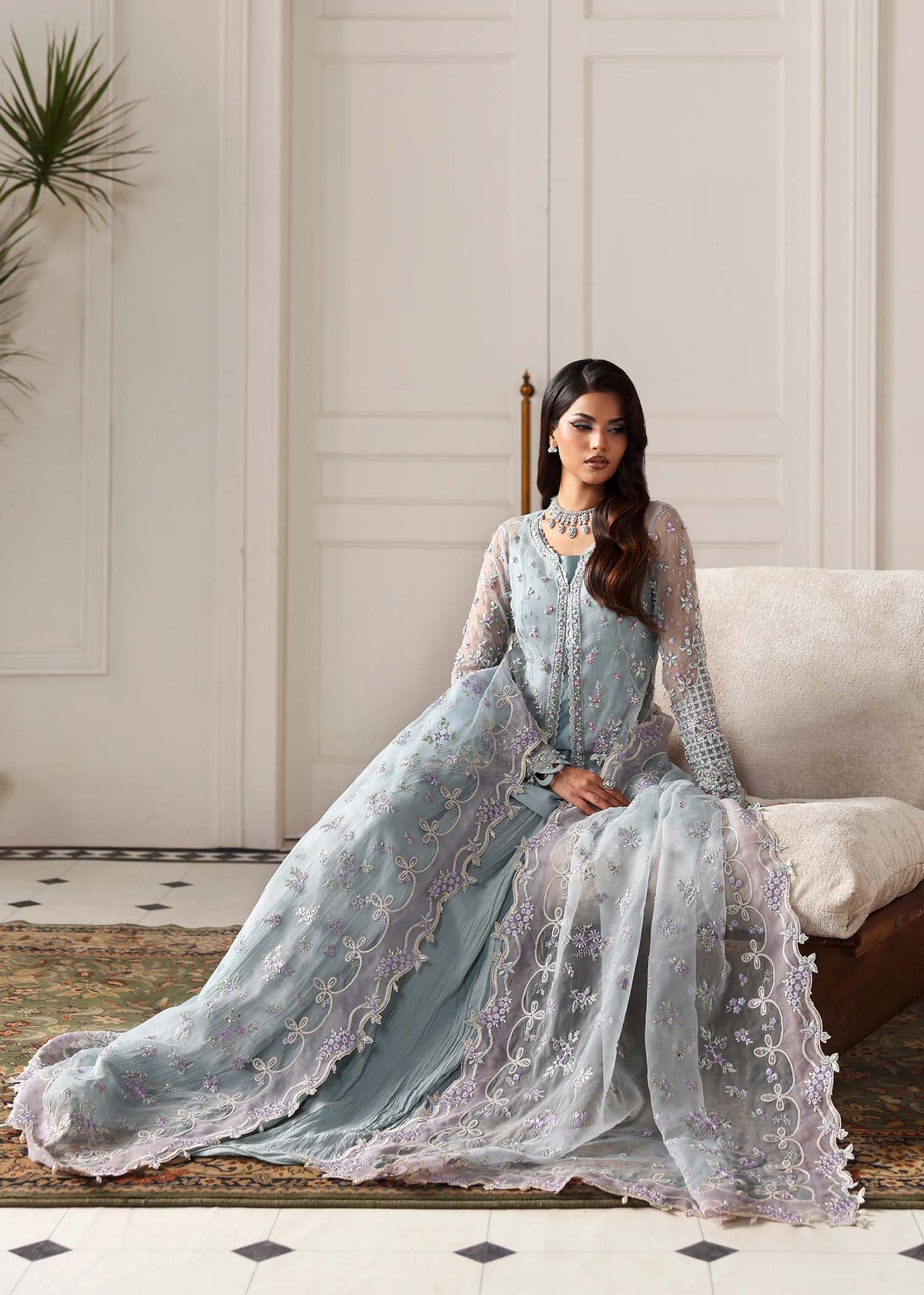 Eisley, made by MAIRAZ — celestial blue peplum, seated view showing trousers and dupatta