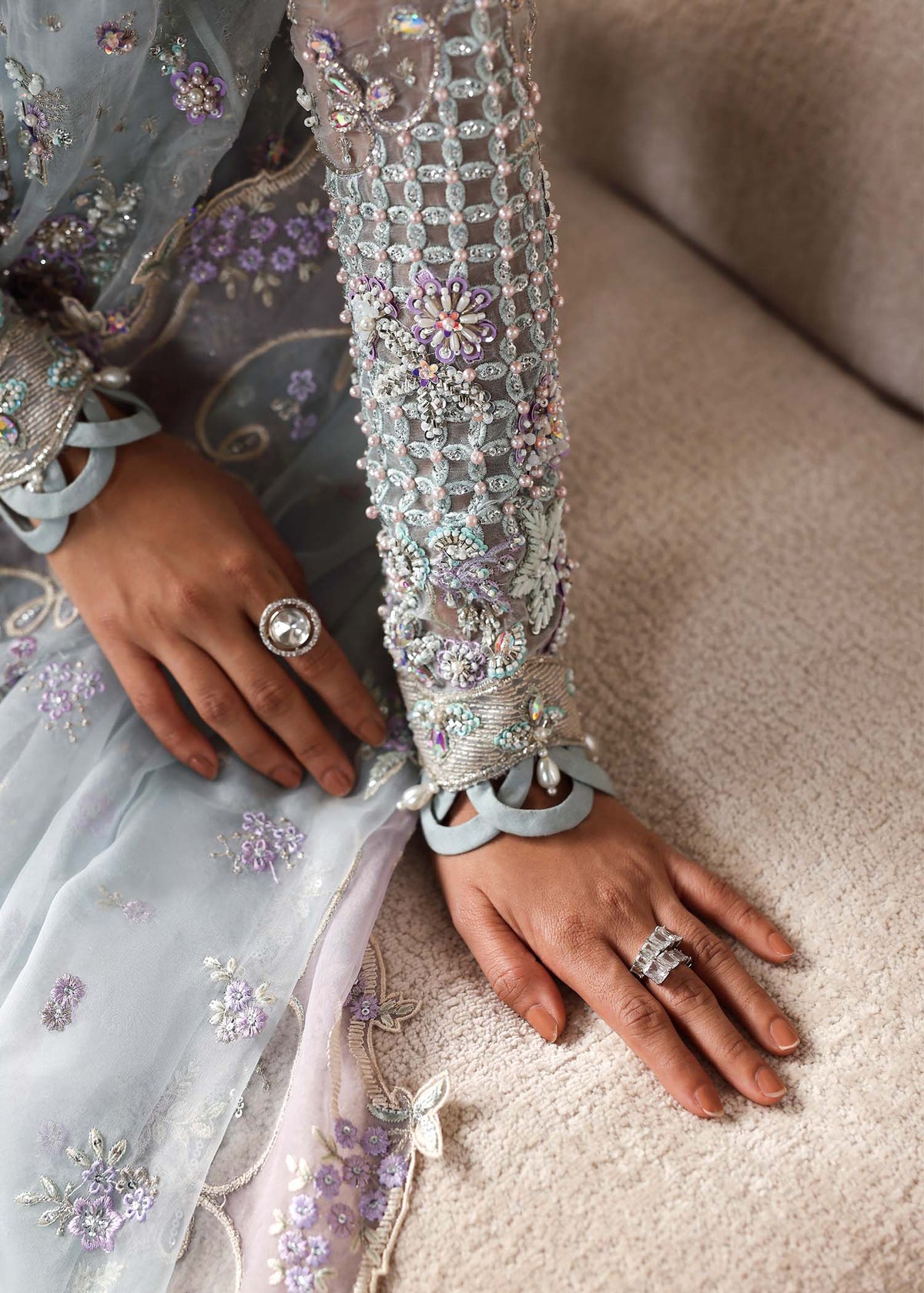 Eisley, made by MAIRAZ — celestial blue peplum, sleeve embellishment close-up