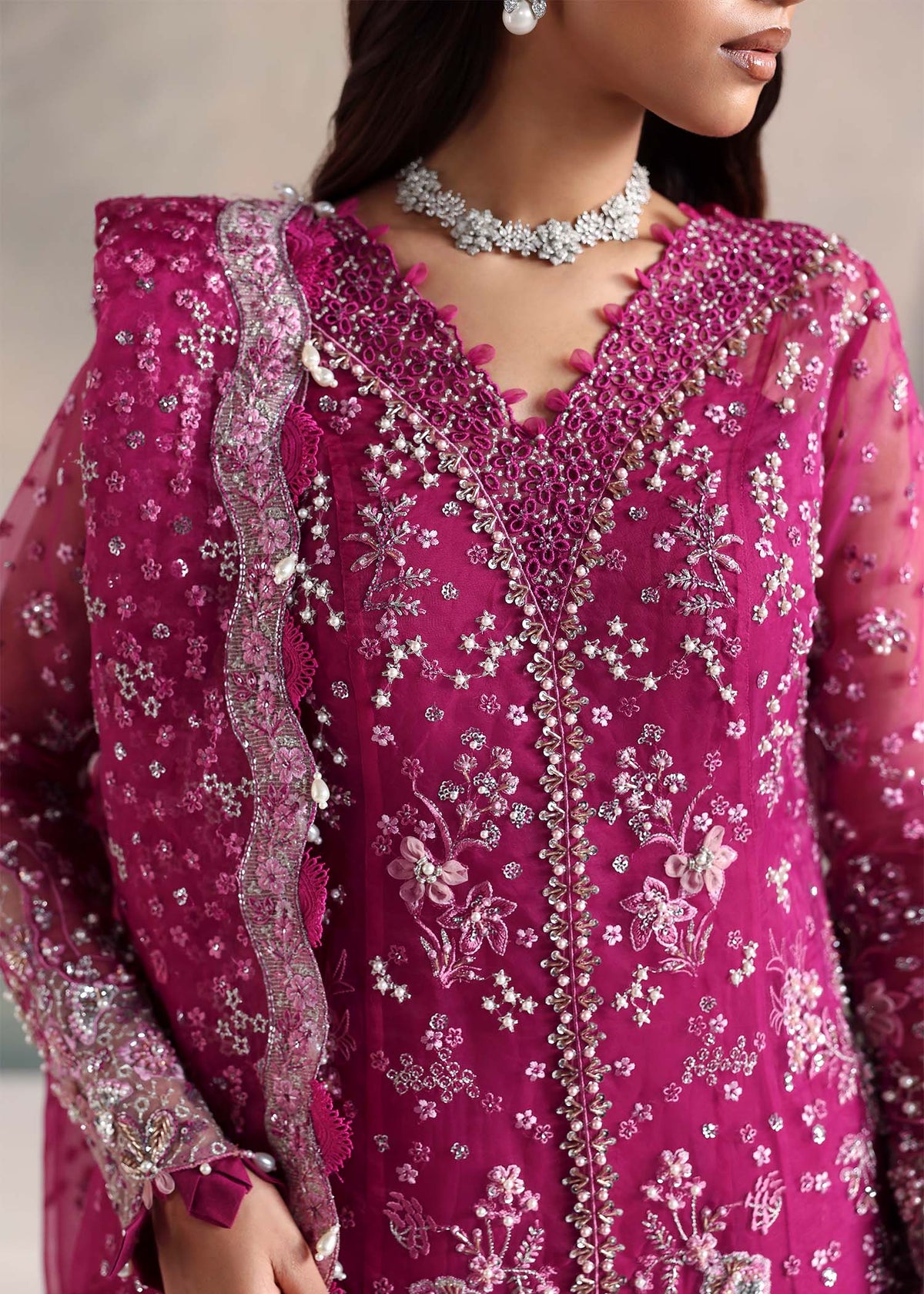 Emira, made by MAIRAZ — plum long shirt, neckline and bodice embroidery detail