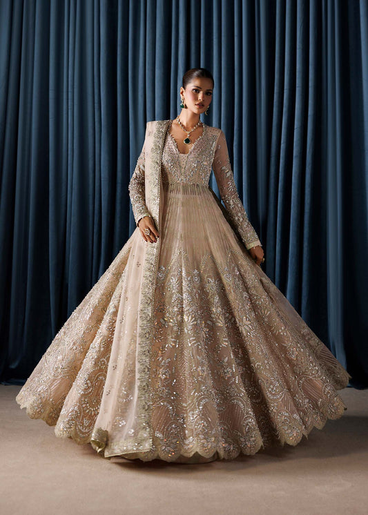 Lamia, made by MAIRAZ — champagne maxi, full-length skirt flare view