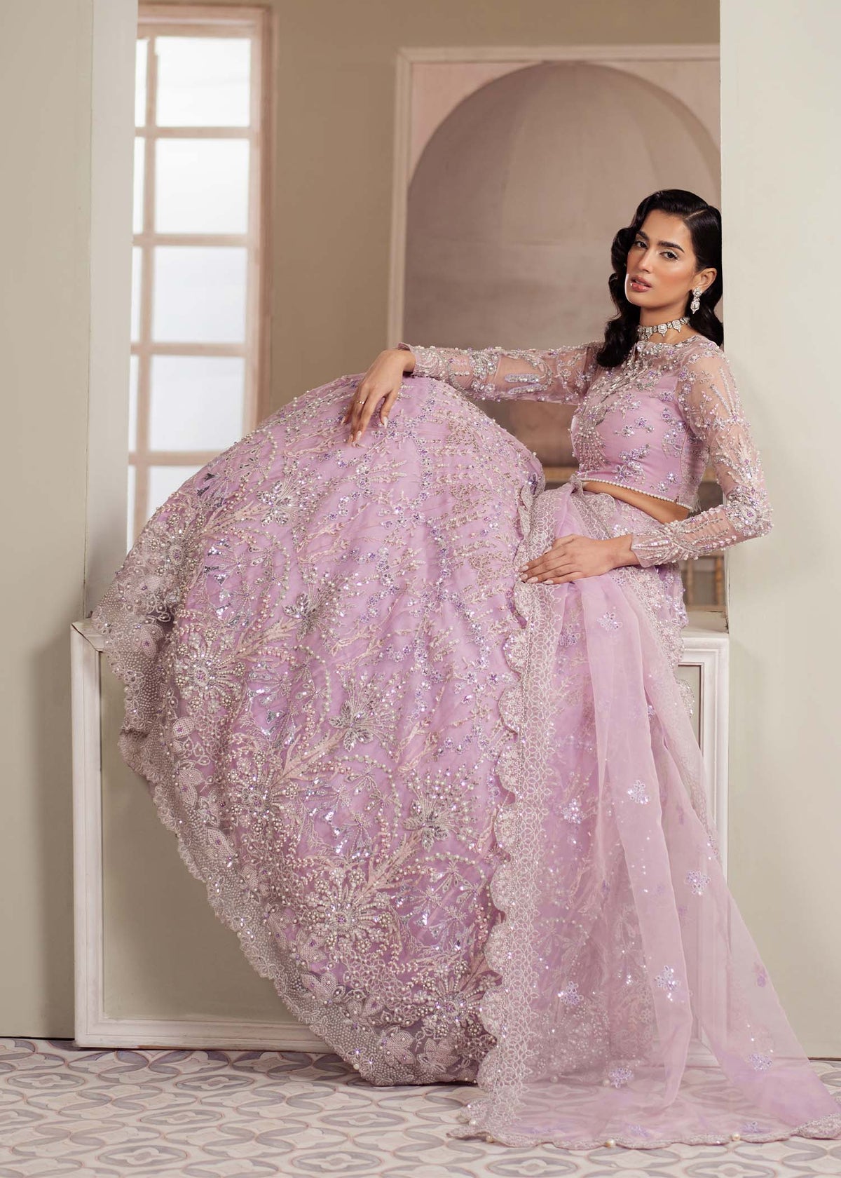 Lustre, made by MAIRAZ — lilac lehenga choli, seated view showing lehenga and dupatta