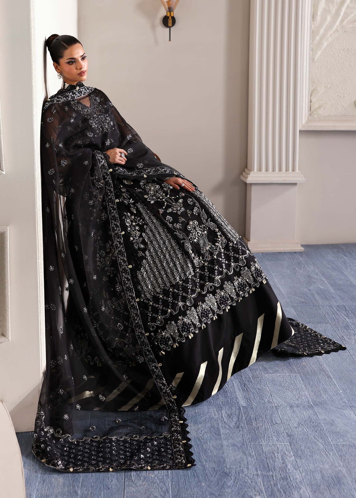 Stella, made by MAIRAZ — midnight black pishwas, full-length flare view