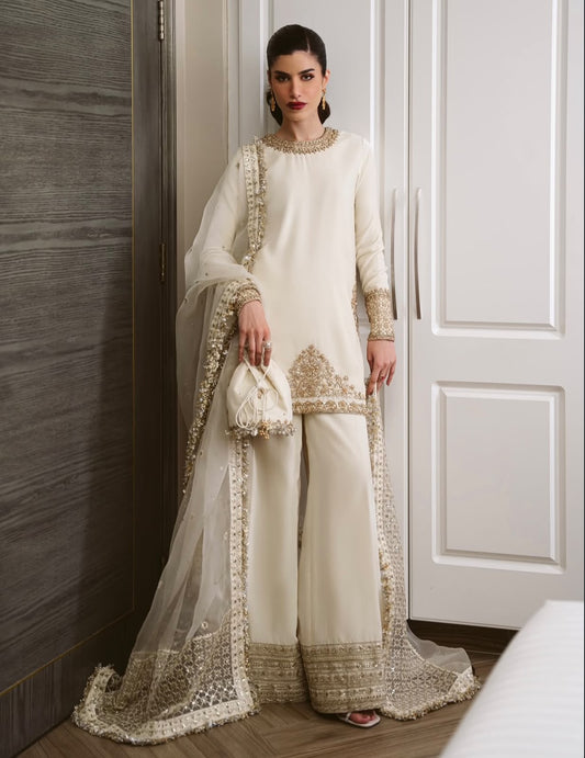 Ivory, made by MAIRAZ — full-length front view of the ivory shirt, wide-leg trousers and bordered dupatta