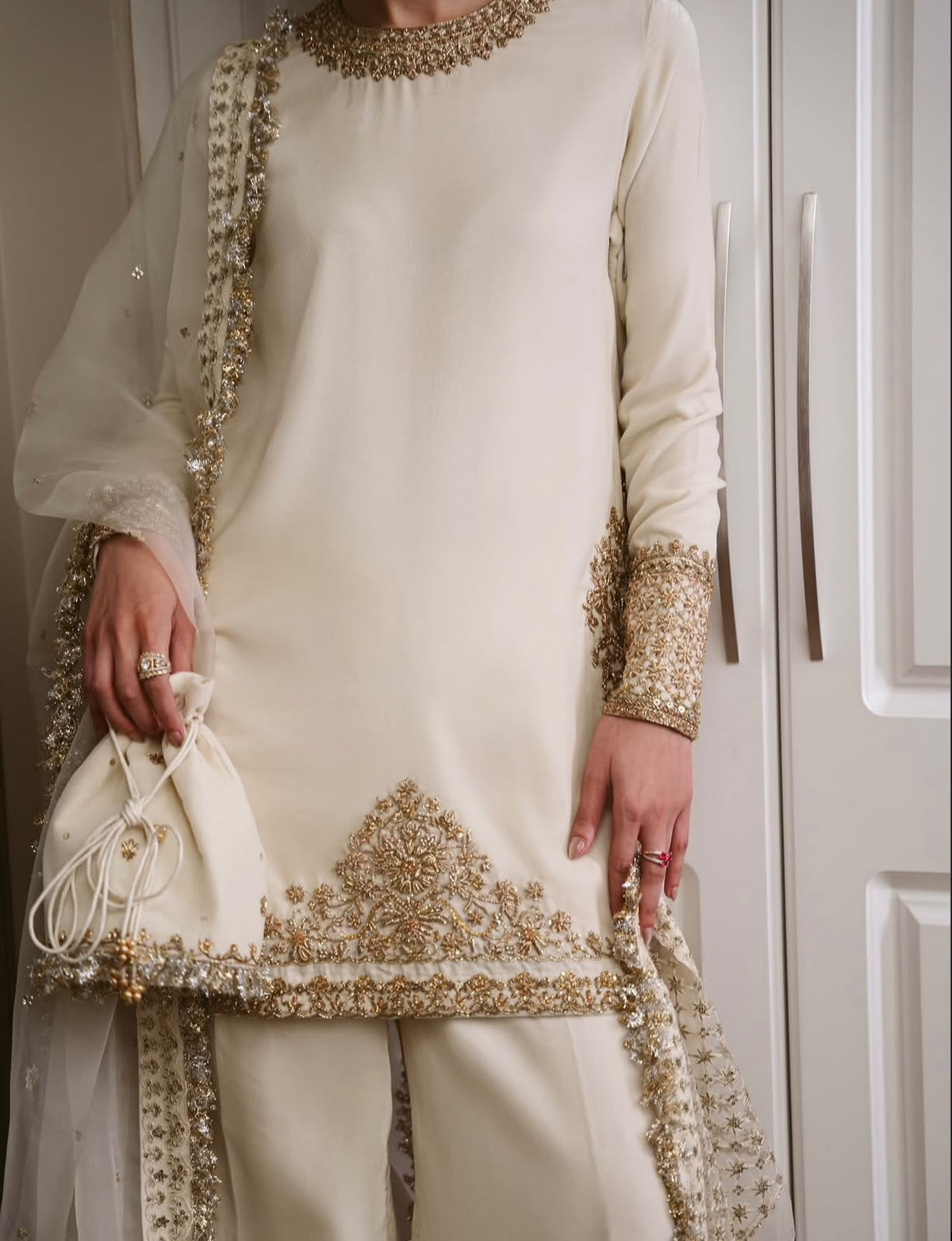 Ivory, made by MAIRAZ — close-up of the embellished front hem, cuffs and dupatta border