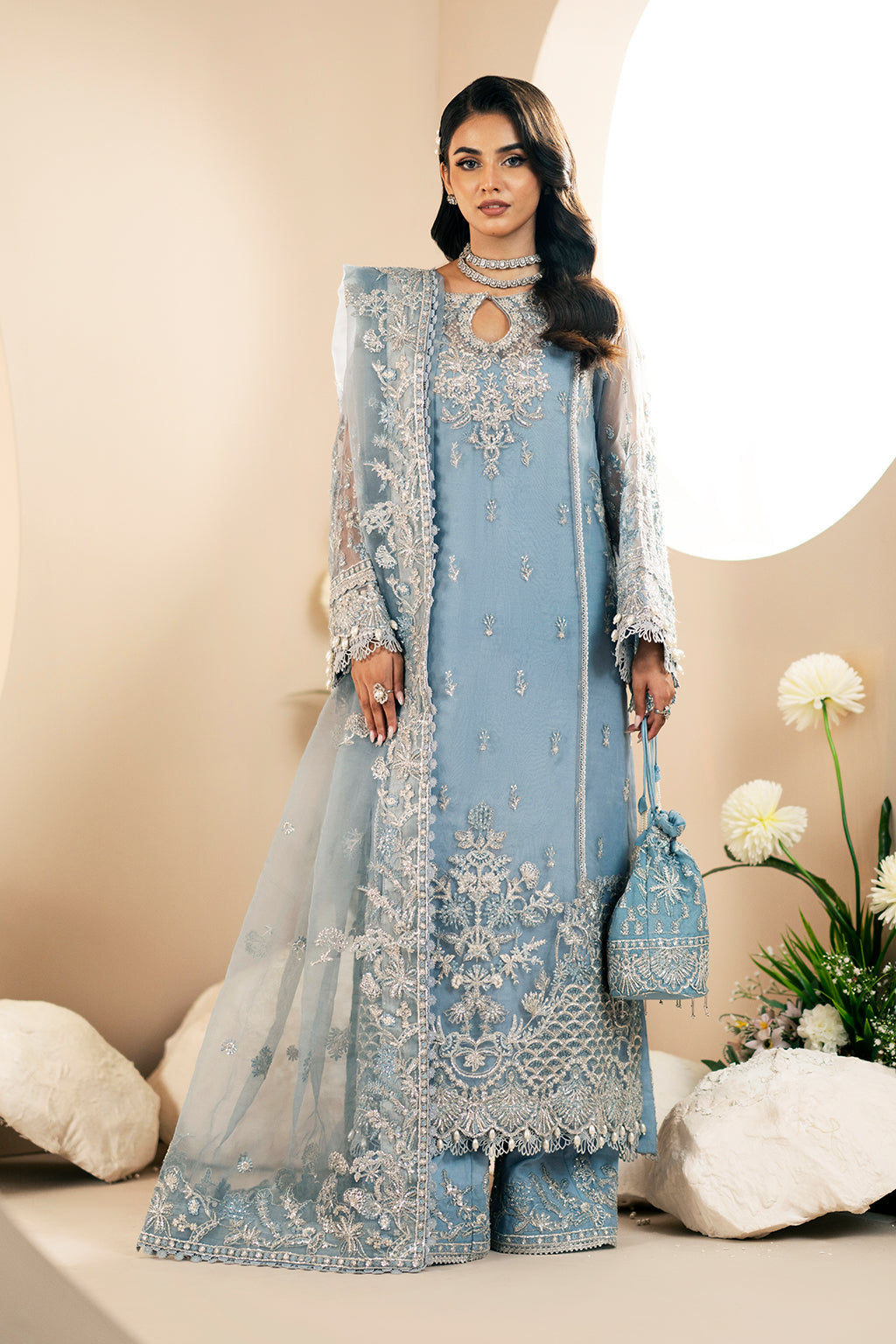 Lotus, made by MAIRAZ — full-length front view of the powder-blue organza suit and dupatta