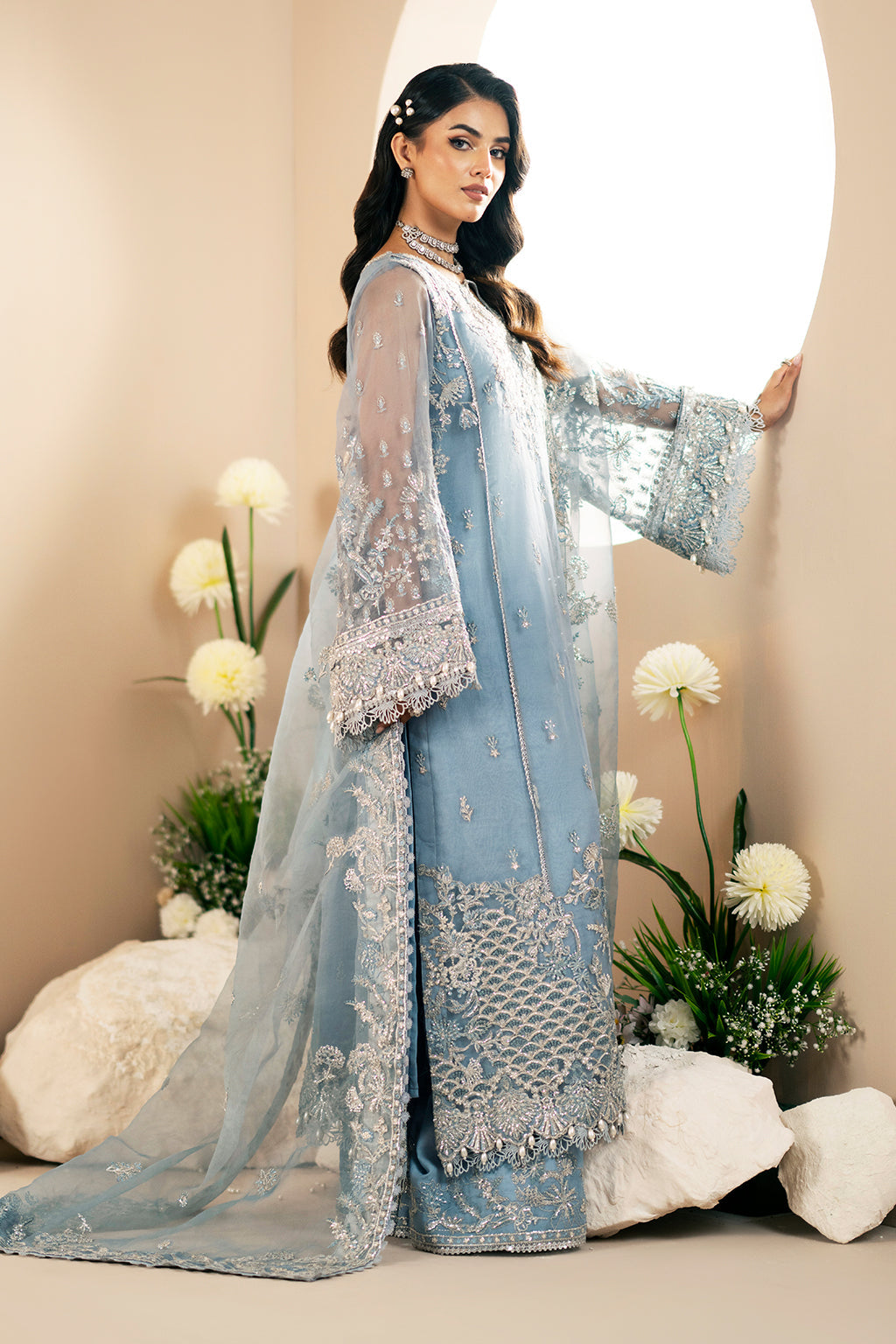Lotus, made by MAIRAZ — side view showing the bell sleeves and trouser border